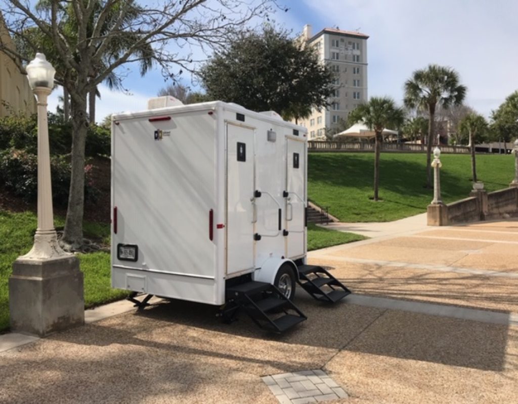 Upscale luxury porta potty featuring spacious interior and premium amenities