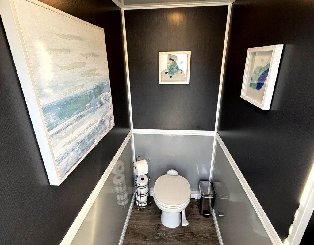 Golden Coast Restrooms servicing wedding with luxury porta potty