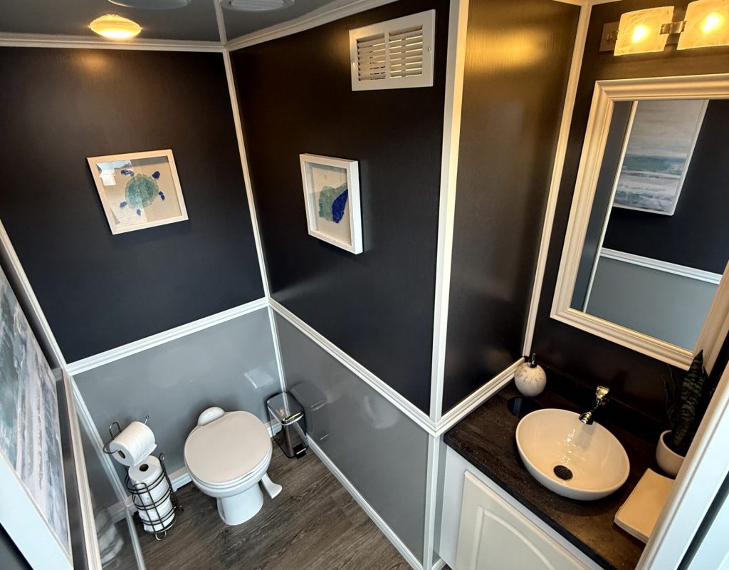 2-stall-restroom-trailer-womens Inside view of Golden Coast’s elegant restroom units