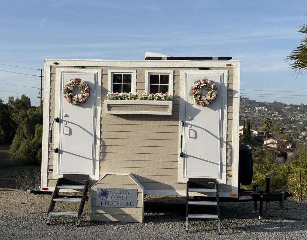 Tan Cottage Interior view of a luxury portable restroom showing vanity, lighting, and climate control