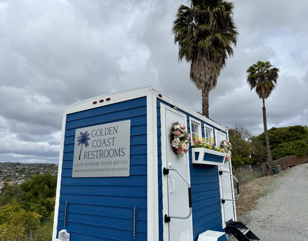 IMG_7460 Interior view of luxury portable restroom with elegant lighting and amenities