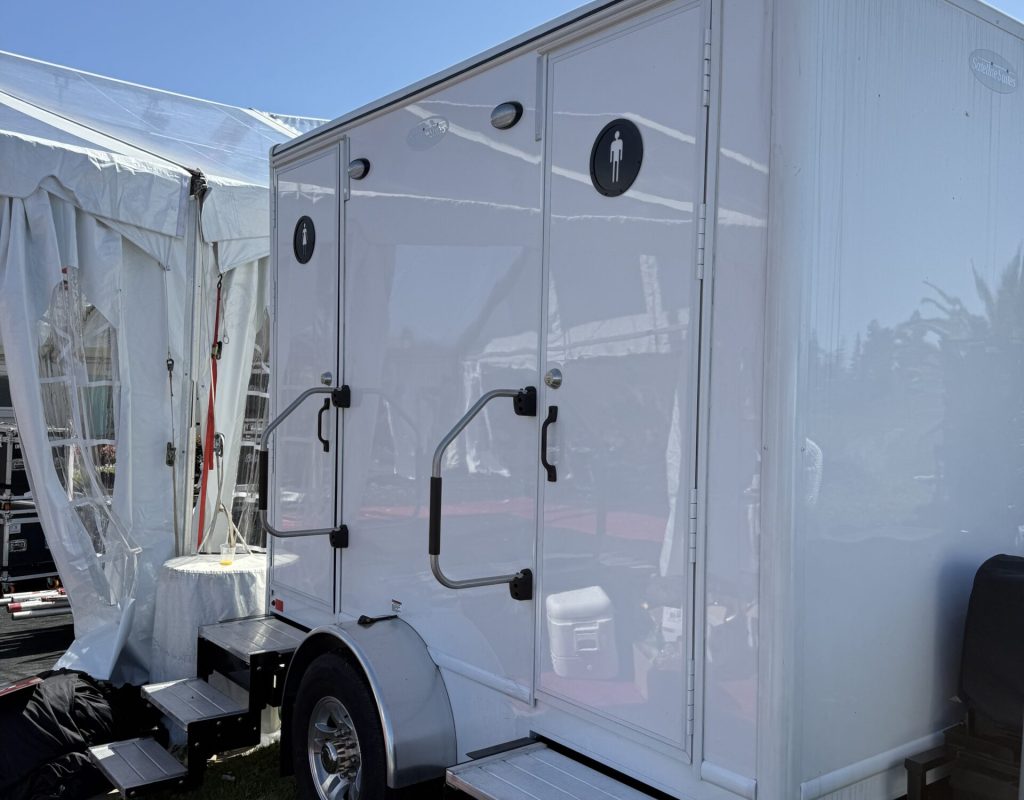 Golden Coast Restrooms delivering clean portable toilets for outdoor events