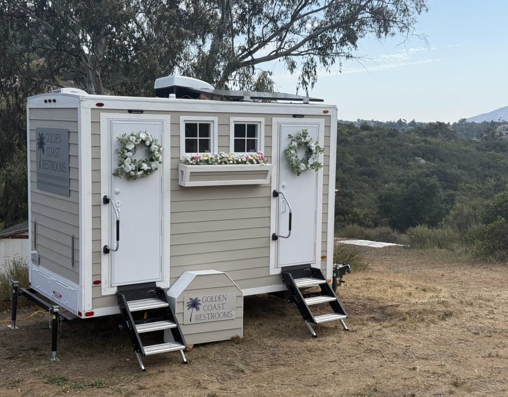 Well-maintained upscale porta potty serviced by Golden Coast Restrooms
