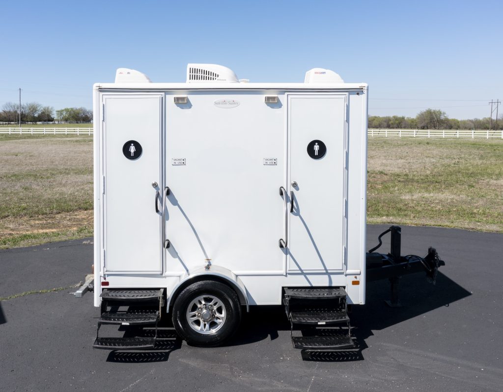 Upscale luxury porta potty featuring spacious interior and premium amenities