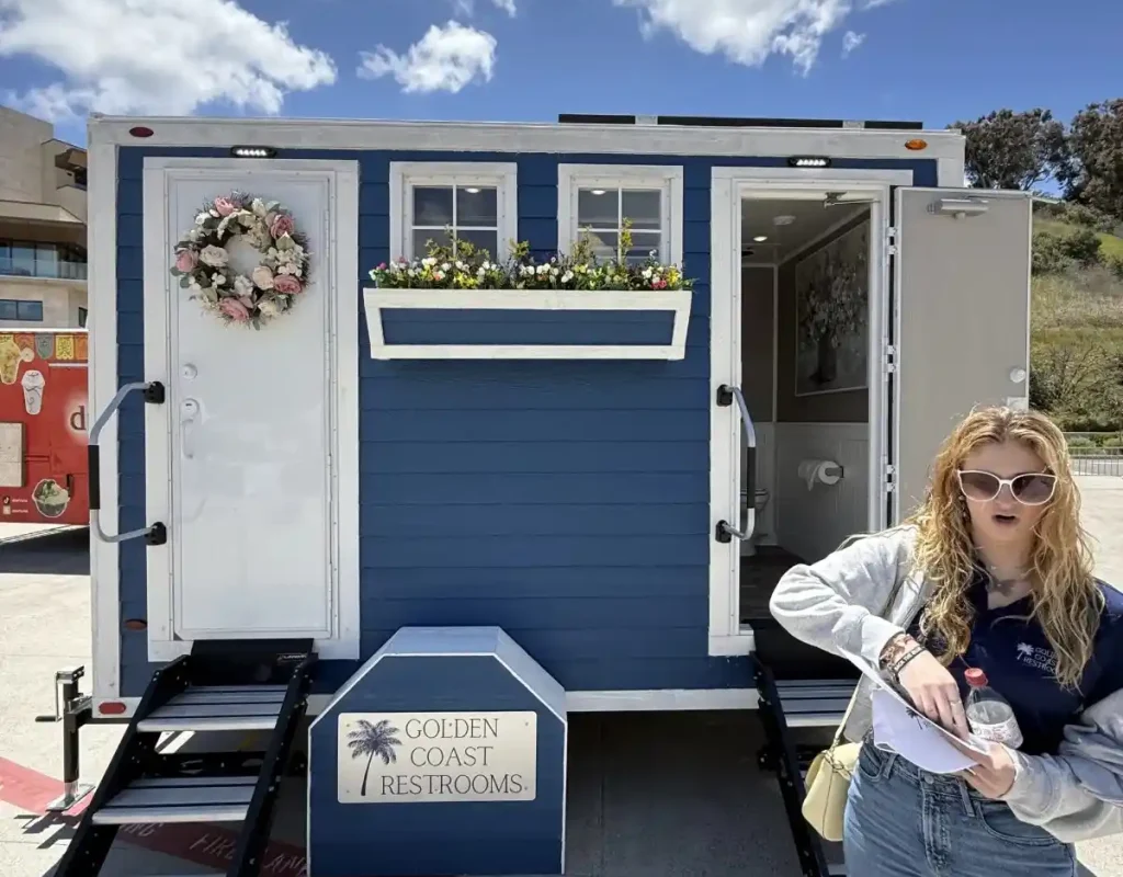Luxury portable restroom positioned in an accessible area for a North Park event. luxury porta potty near me